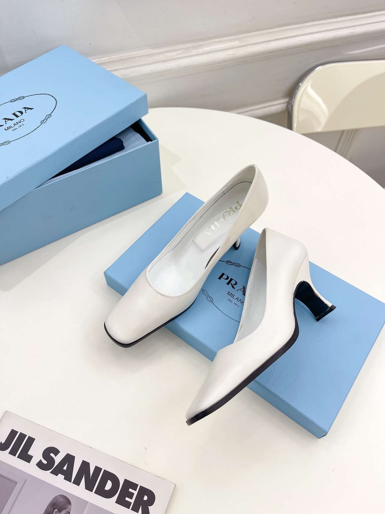 Pra*a Brushed Pumps White For Women