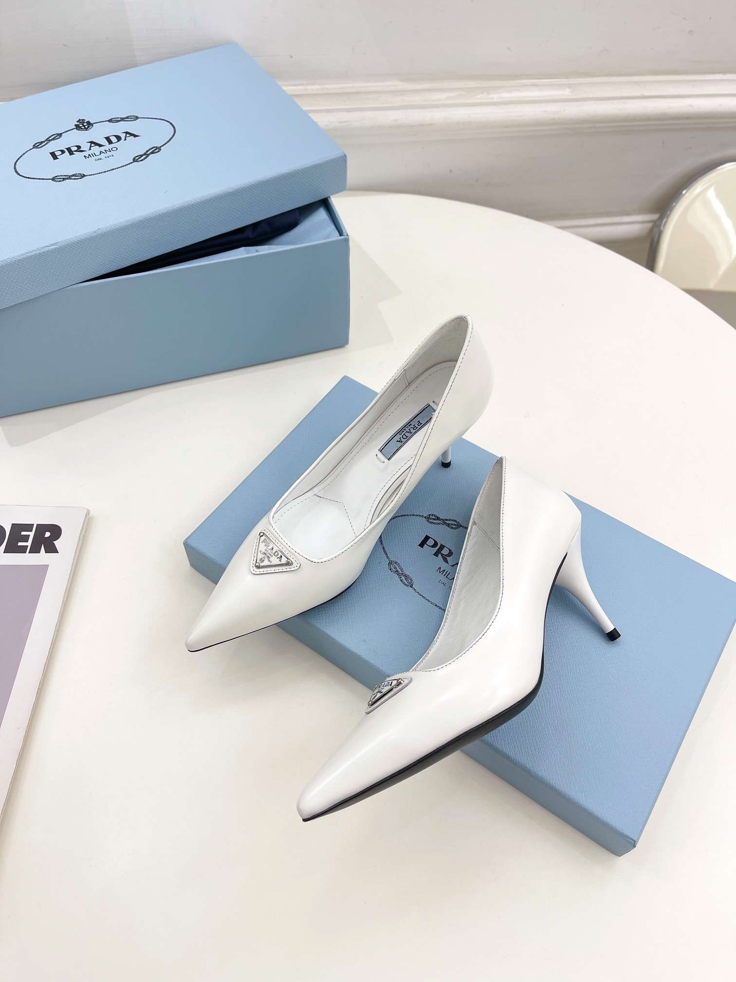 Pra*a Spike Pumps White For Women