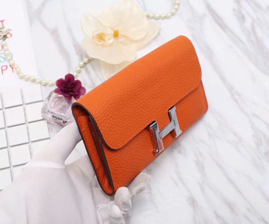 H**me5 Constance Togo Long Wallet 20cm/7.9in Silver Toned Hardware For Women Orange